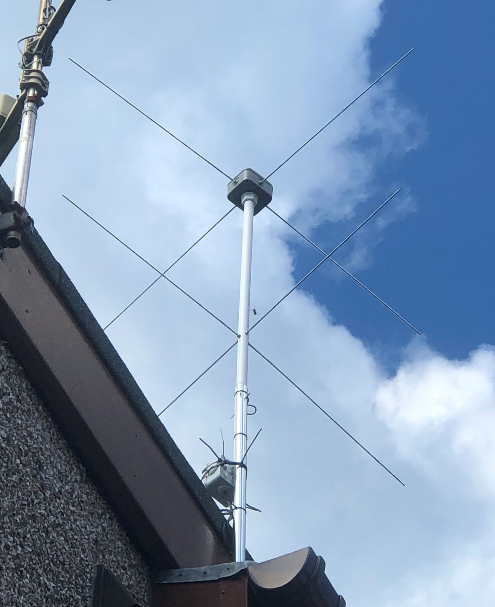 The M7CBR VHF Mk.I turnstile antenna mounted outside.
