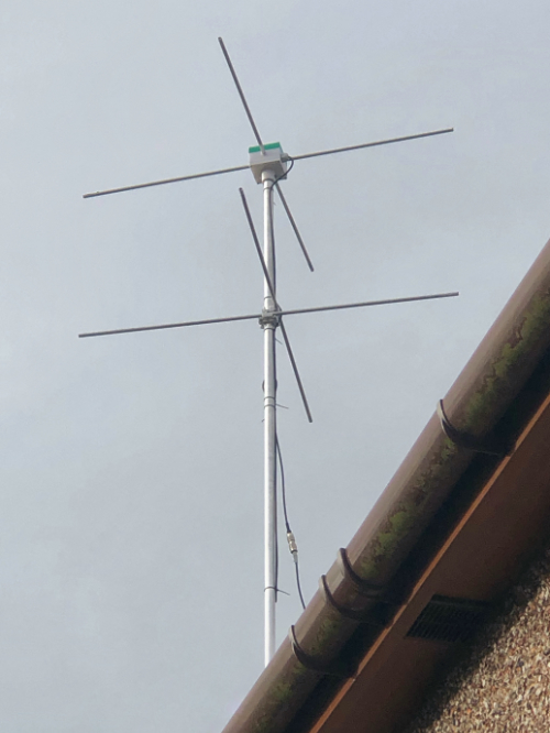 The M7CBR VHF Mk.II turnstile antenna mounted outside.